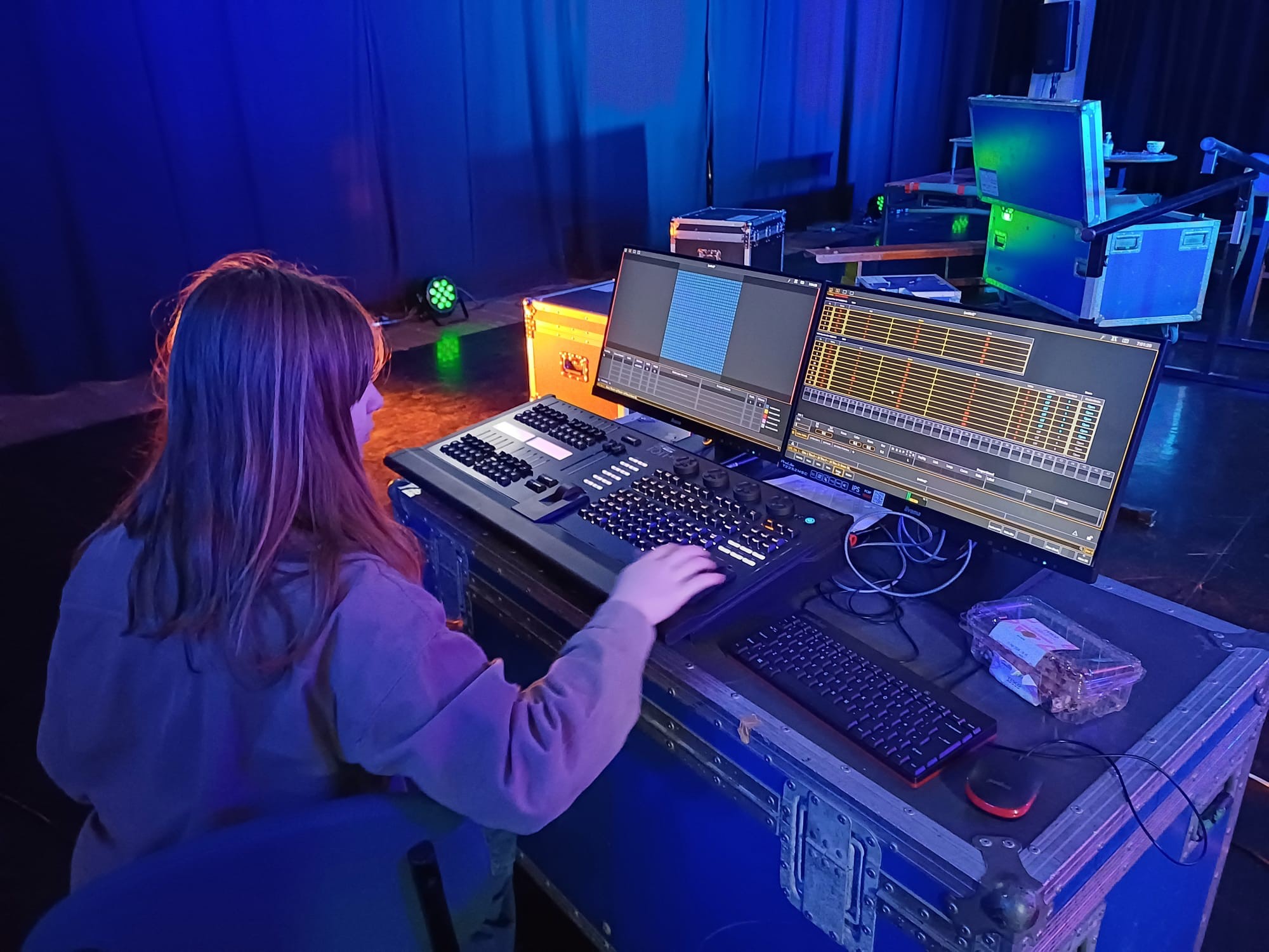 Young Woman on Sound and Lighting Board